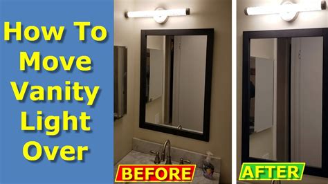 moving vanity light over bathroom wall